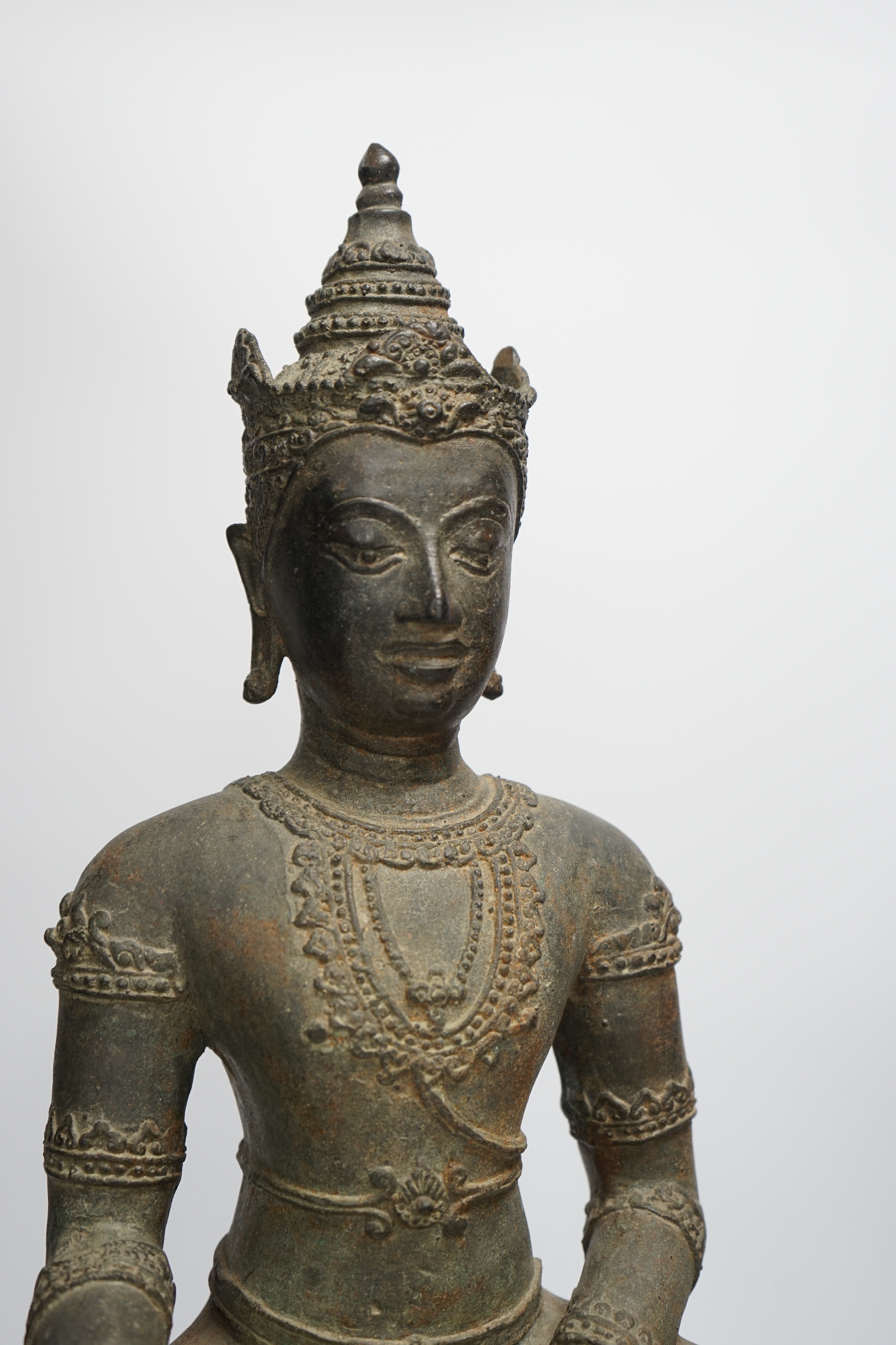 A late 19th/early 20th century Lanna style Thai bronze Buddha, 52cm